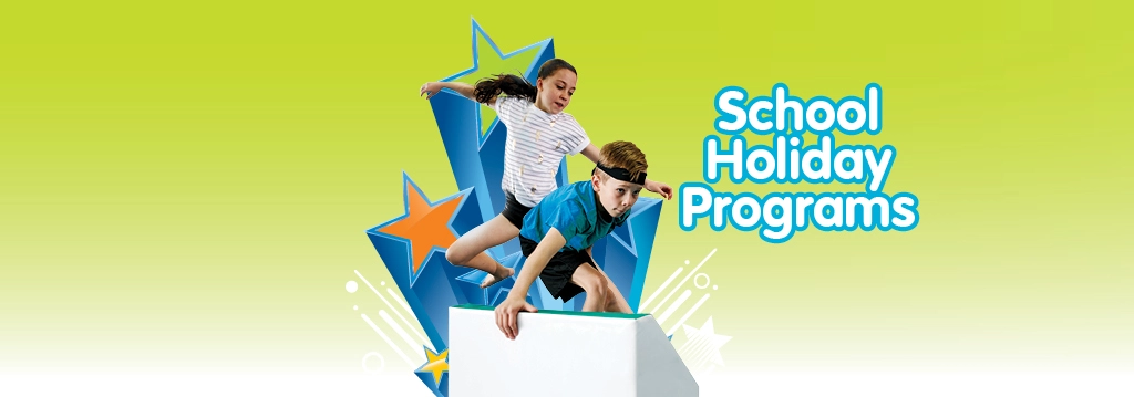 boy and girl leaping school holiday programs